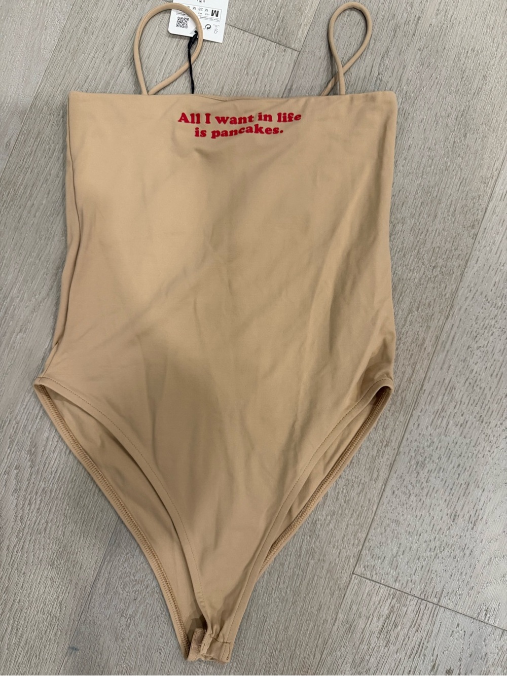 Zara Terez Beige Bodysuit with Red Text